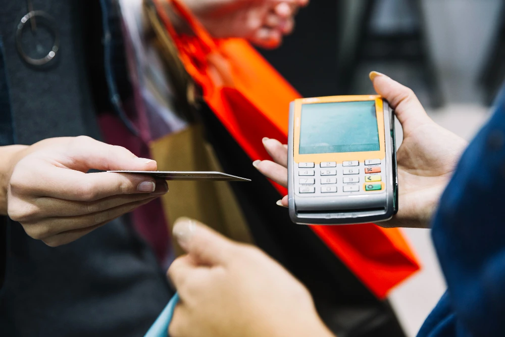 Financial consultants reviewing merchant cash advance options for small business funding needs